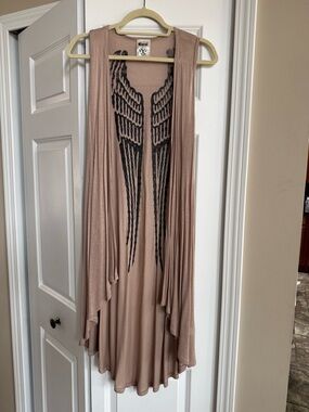Vocal Beige Sleeveless Drape Vest with Black Wing Back Print